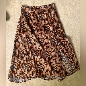 High waisted silk skirt with small slit